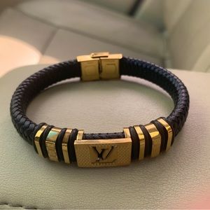 Mens Louis Vuitton Braided leather-stainless steel bracelet.